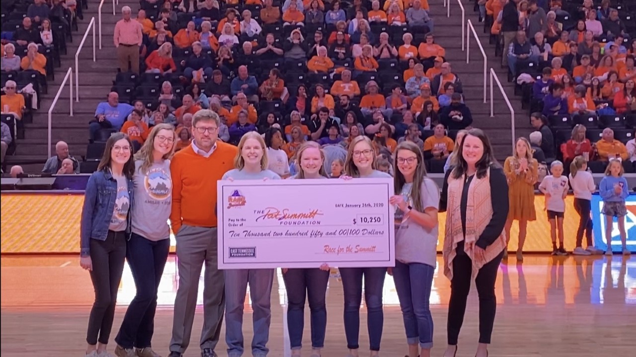 Students present check to Pat Summitt Foundation